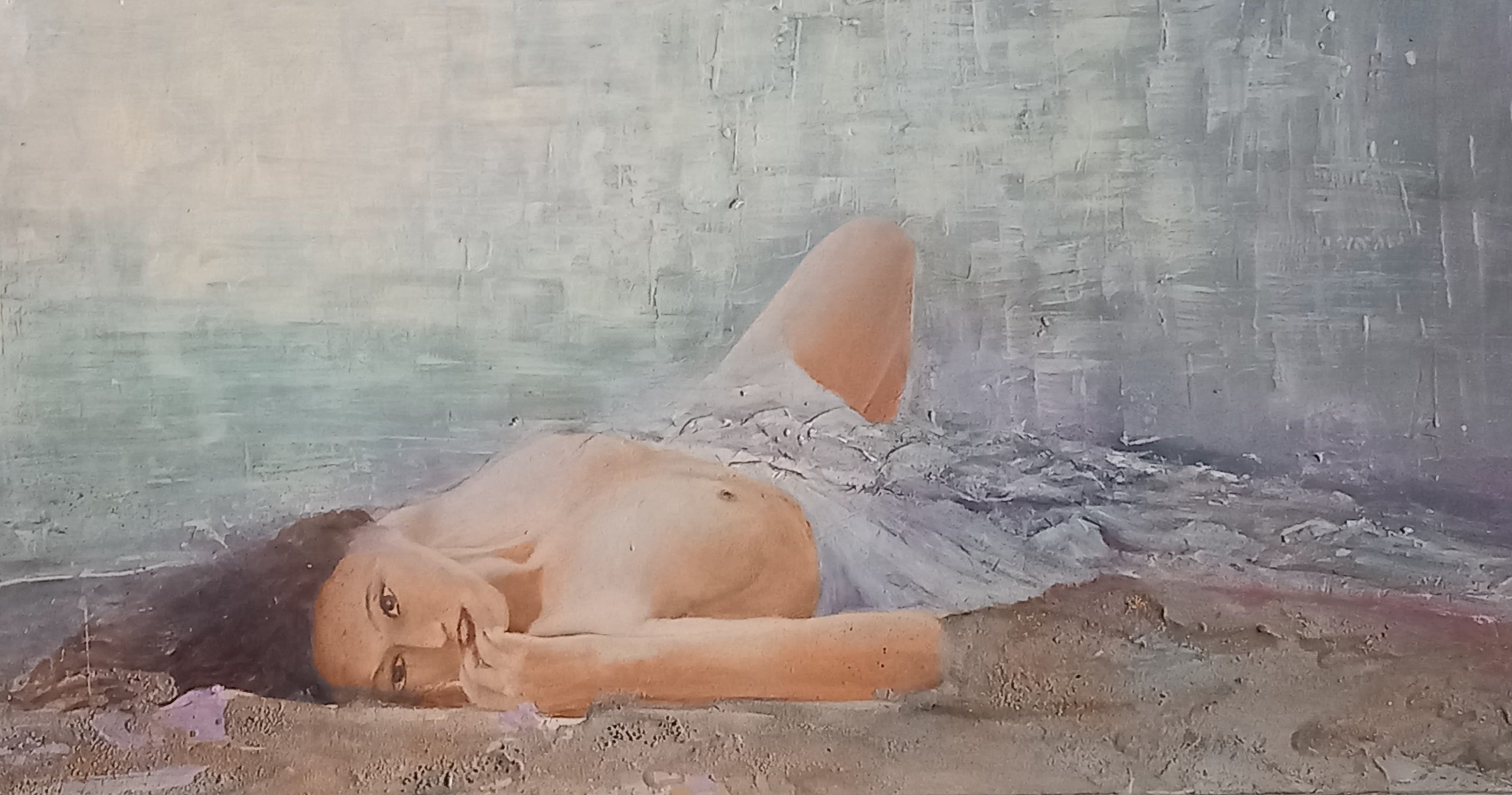 Woman lying in the water