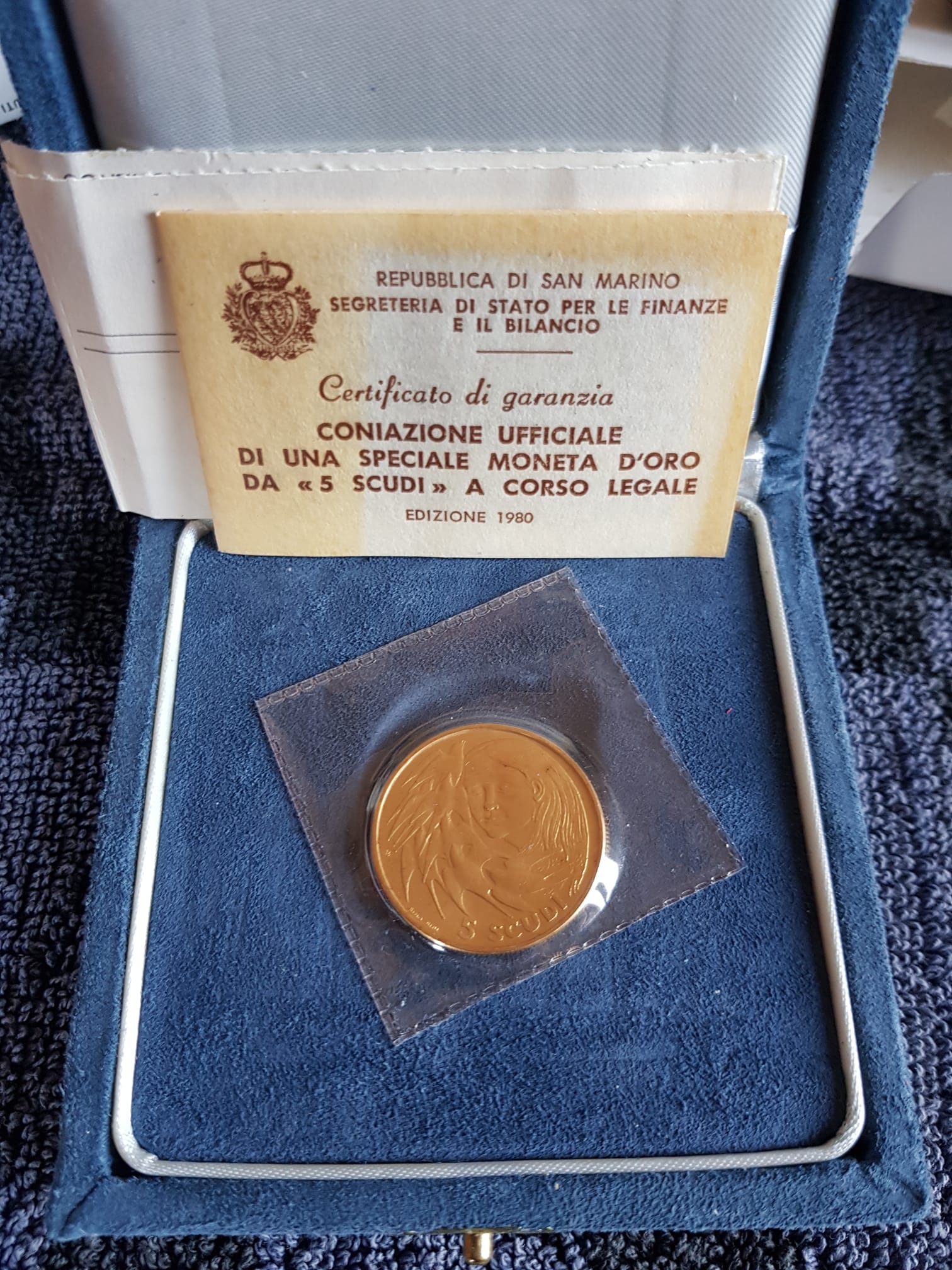 Coniazione ufficiale moneta d'oro da cinque scudi a corso legale - Repubblica di San Marino