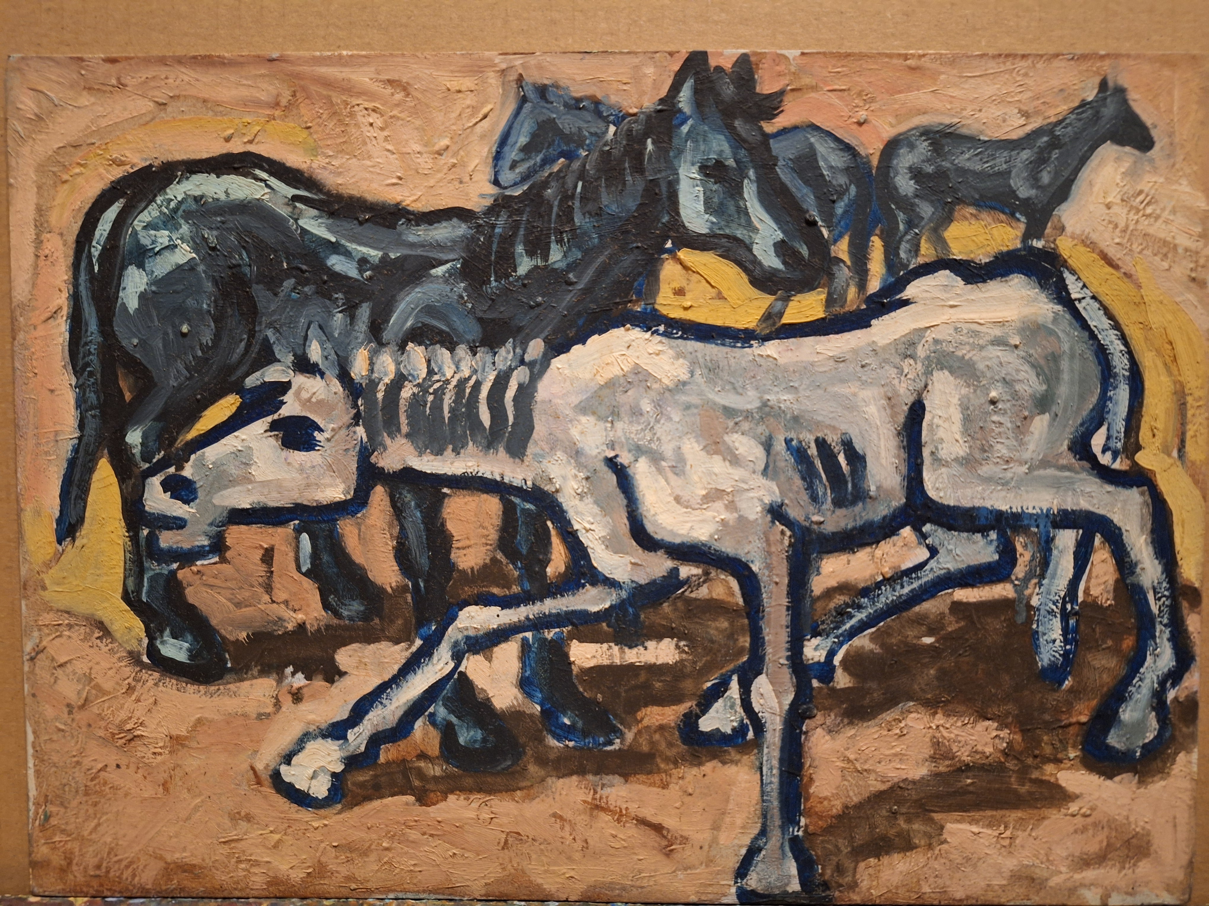 Cavallo bianco e cavalli neri