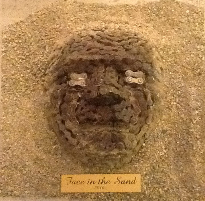 Luca Echampi - Face in the sand