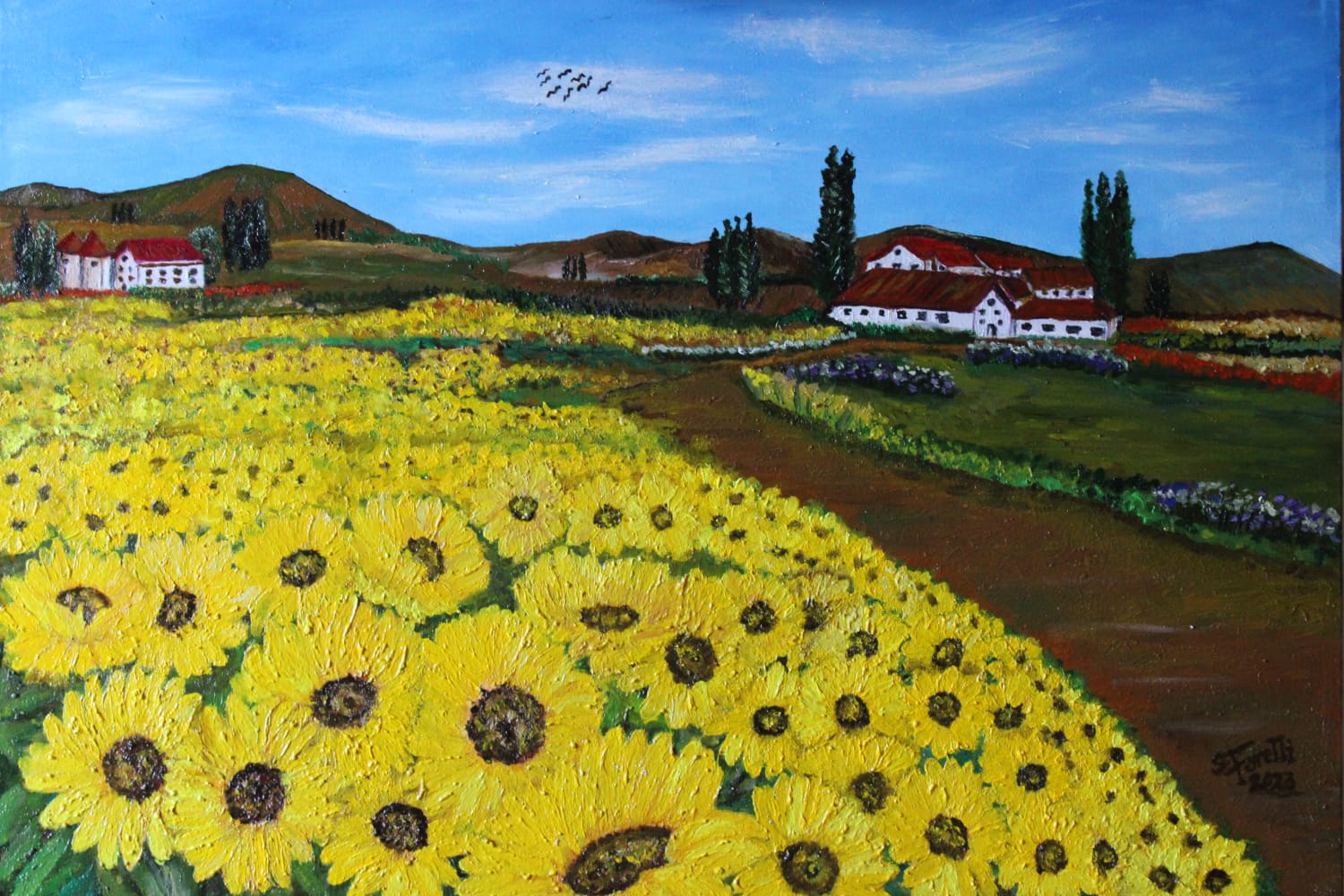 Paesaggio toscano con girasoli