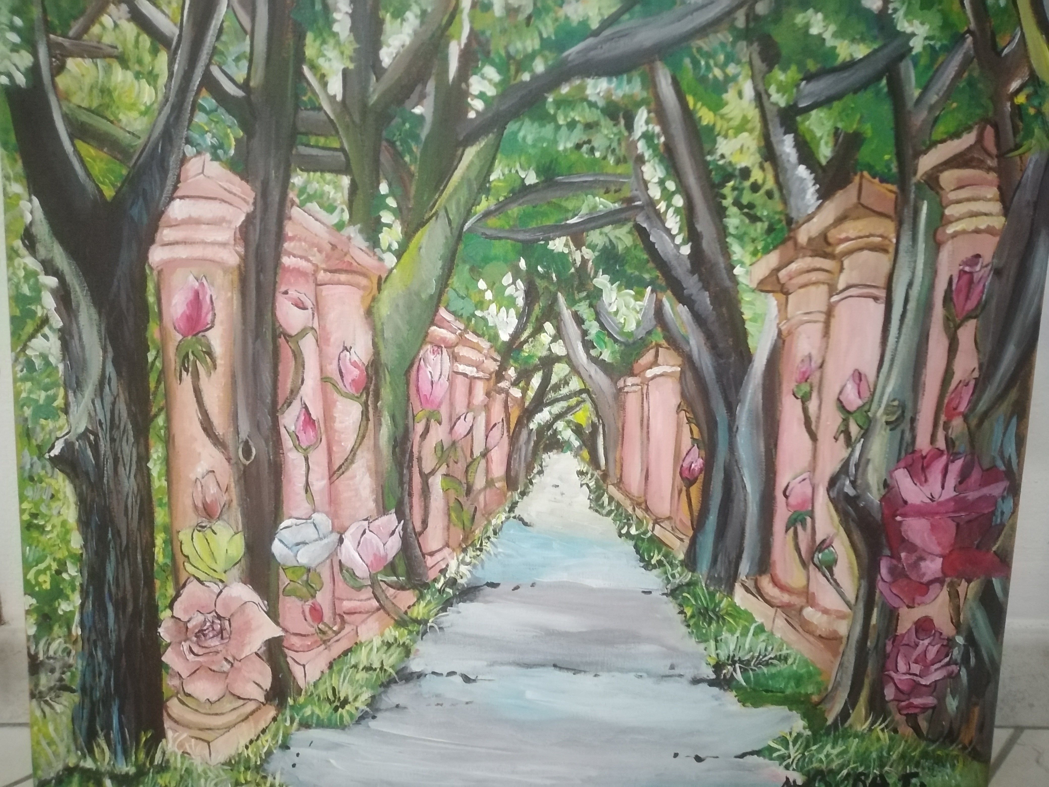 The tree-lined avenue accompanied by roses