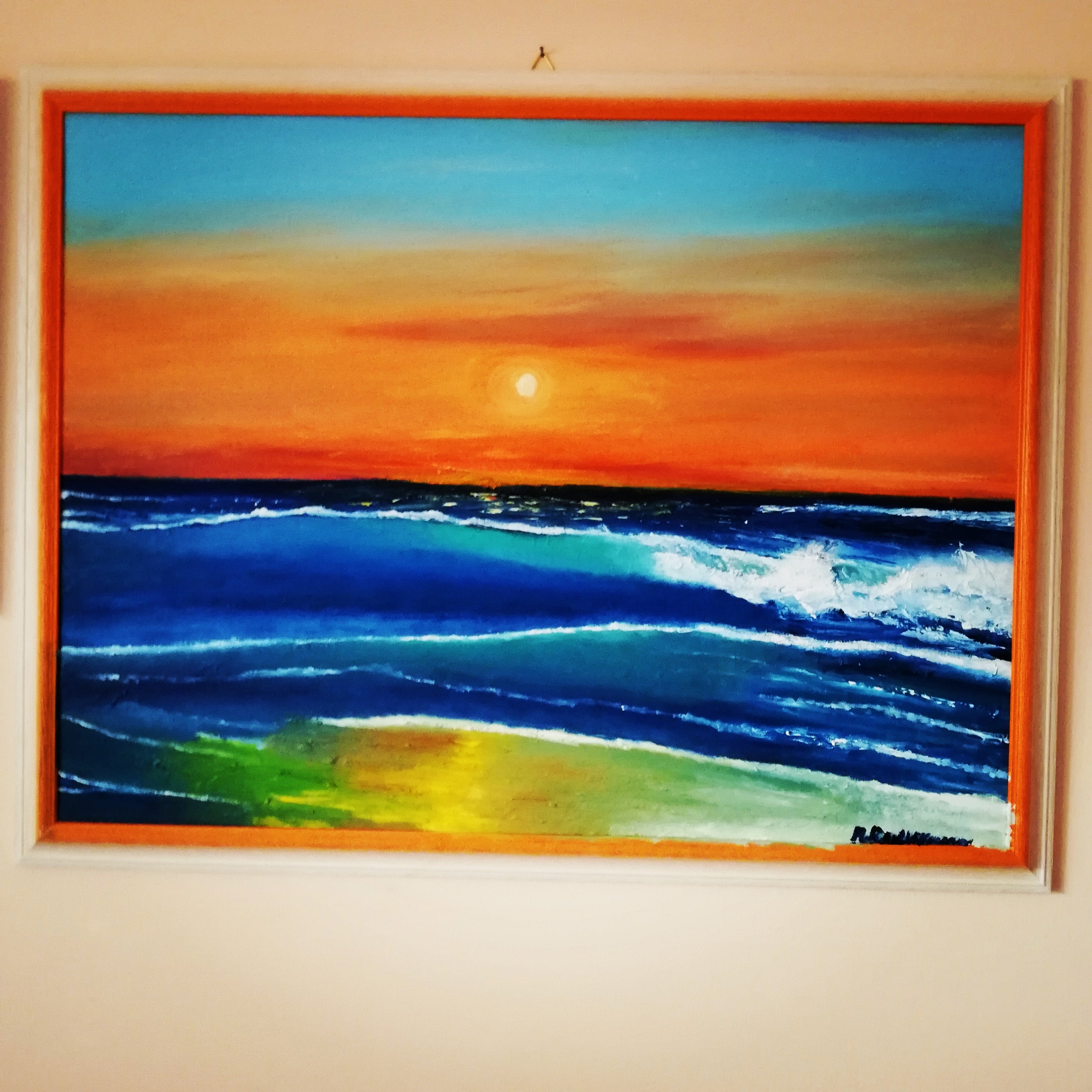 Los colores de un atardecer en el mar infinito