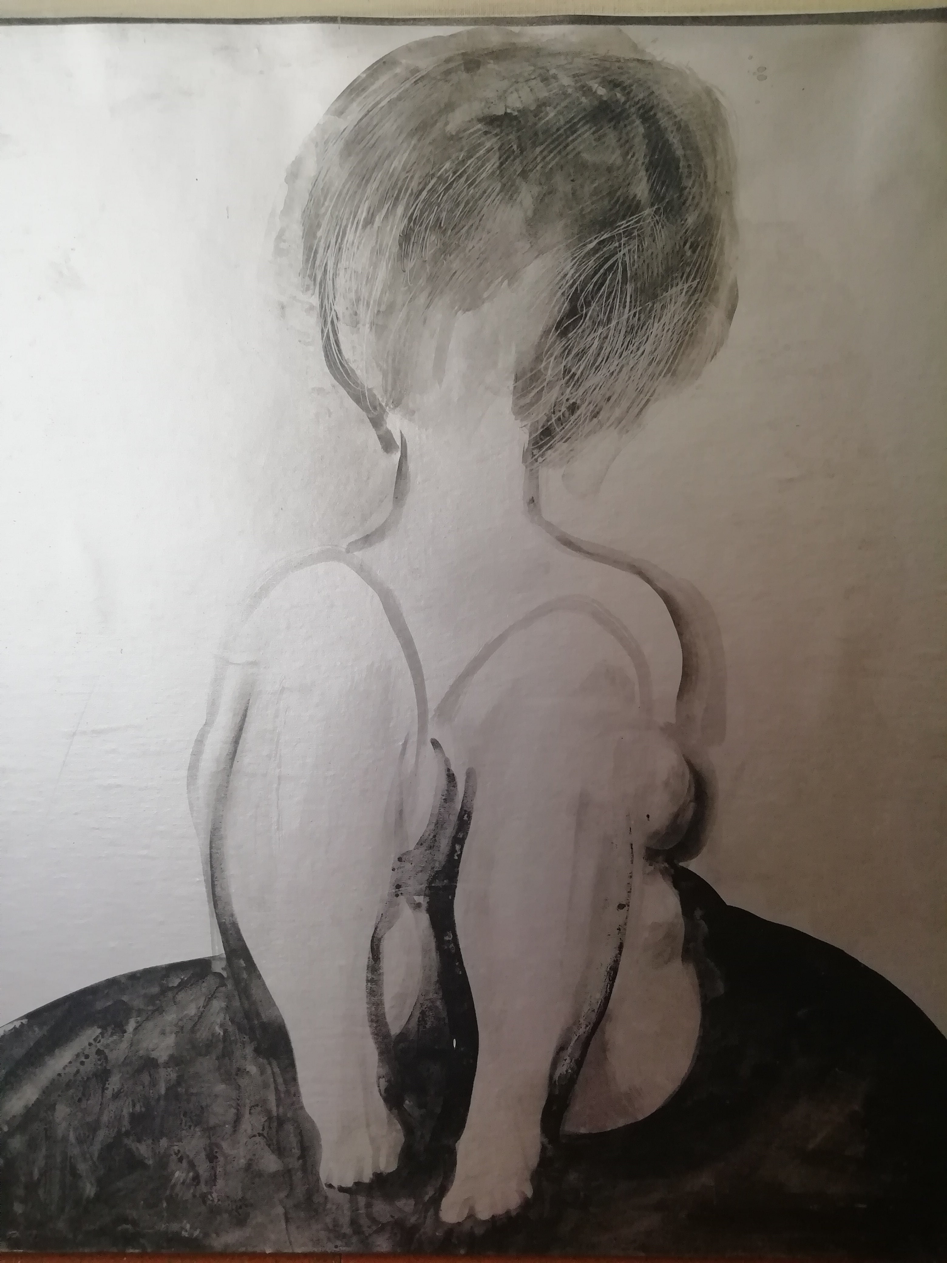 Desnudo sentado
