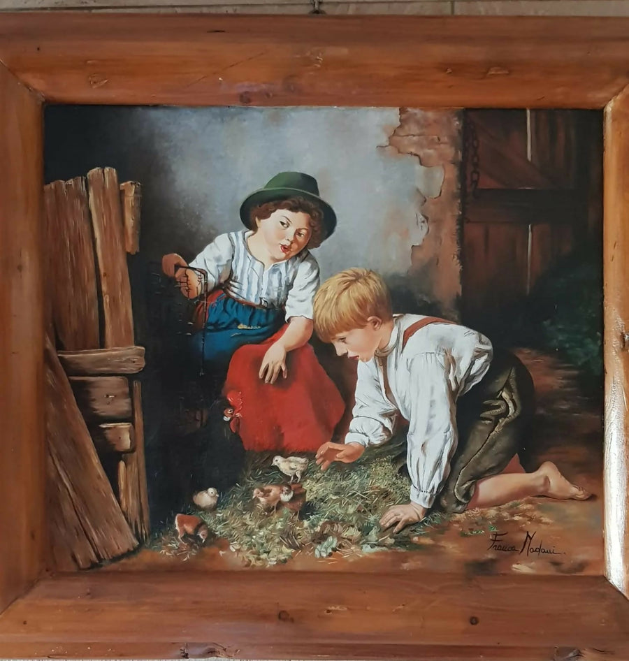 Niños con pollitos